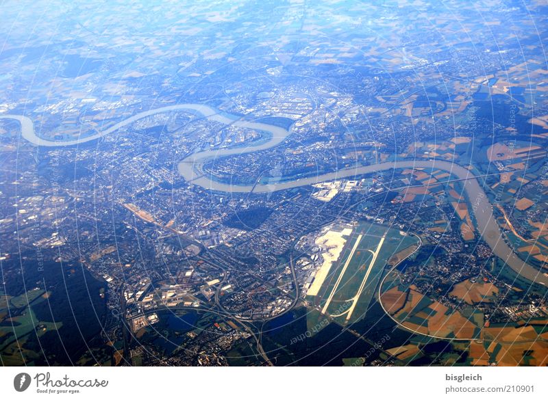 serpentine line River Town Airfield Blue Wanderlust Colour photo Subdued colour Exterior shot Aerial photograph Day Bird's-eye view