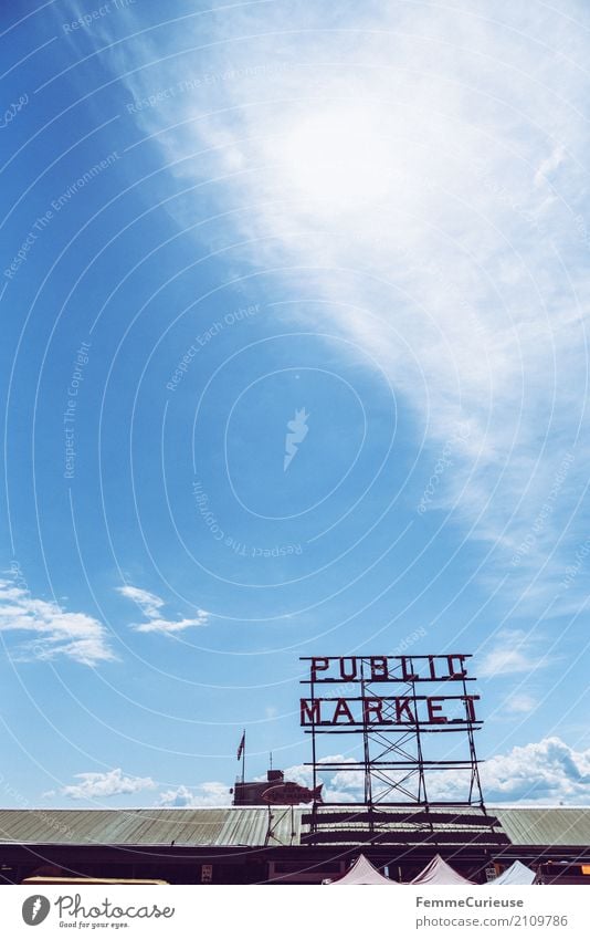 Roadtrip West Coast USA (261) Town Shopping Covered market Market day Markets public market Seattle Summer Sunbeam Roof Signage Characters Blue sky Clouds