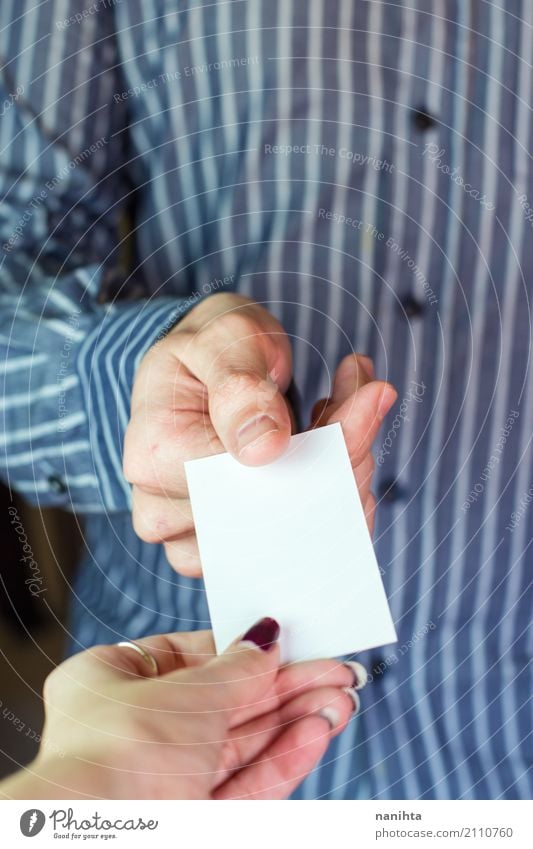 Man giving a blank card to a woman Work and employment Business Meeting To talk Calling card Blank Card Human being Masculine Feminine Young woman