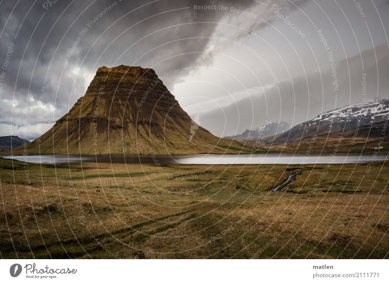 bundt cake Landscape Plant Sky Clouds Spring Weather Snow Grass Rock Mountain Volcano Coast Ocean Gigantic Brown Yellow Gray Green Snæfellsnes Iceland