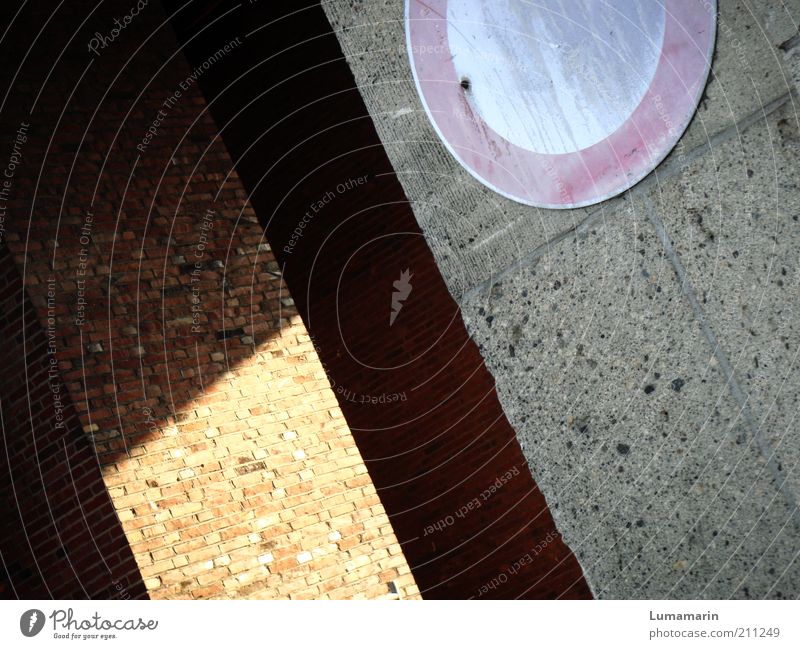 incident Wall (barrier) Wall (building) Transport Sign Signs and labeling Road sign Simple Bright Round Arrangement Symmetry Concrete Passage Bleached Old Bans