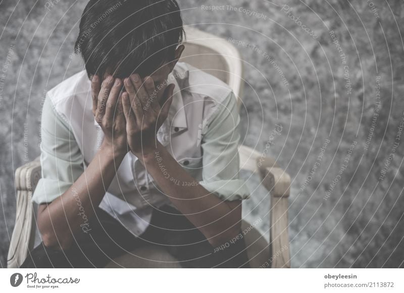 asian man sitting alone in the house Face Human being Man Adults Transport Heart Think Sadness Cry Poverty Anger Pain Loneliness Fear Distress Force Hatred