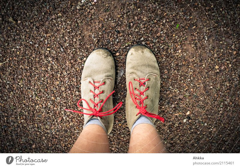 Two old brown shoes with red laces and youthful legs from above Feet Earth Footwear Authentic Under Red Safety (feeling of) Responsibility Conscientiously