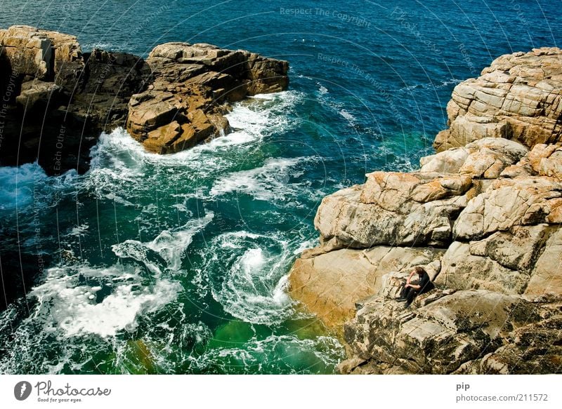 bay watch Human being Masculine 1 Nature Elements Water Summer Rock Waves Coast Bay Reef Stone Observe Sit Threat Fantastic Blue Green Force of nature Foam