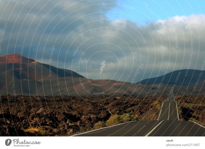 right through Trip Far-off places Landscape Sunrise Sunset Hill Mountain Fuego mountains National Park of Timanfaya Volcano Island Lanzarote Street