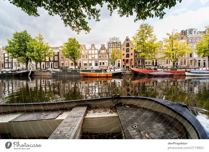 Amsterdam canals III Wide angle Central perspective Deep depth of field Sunbeam Reflection Contrast Shadow Light Day Copy Space middle Copy Space right