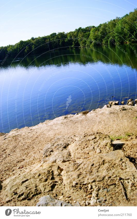 triangular relationship Island Water Beautiful weather Tree Lake Stone Safety (feeling of) Peaceful Calm Blue Green Light blue Triangle Reflection Blue-white