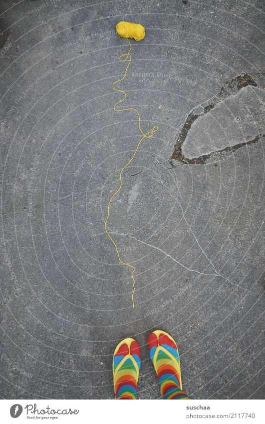 Follow the yellow thread. Legs Feet Footwear Stockings Striped Crazy obliquely Strange Pippi Longstocking Multicoloured Yellow Red Cyan Flip-flops Exterior shot