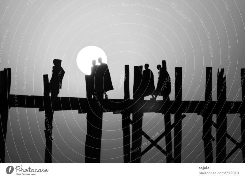 silhouettes of monks Vacation & Travel Tourism Human being Masculine Man Adults 5 Group Sun Amarapura Myanmar Asia South East Asia Bridge Wooden bridge