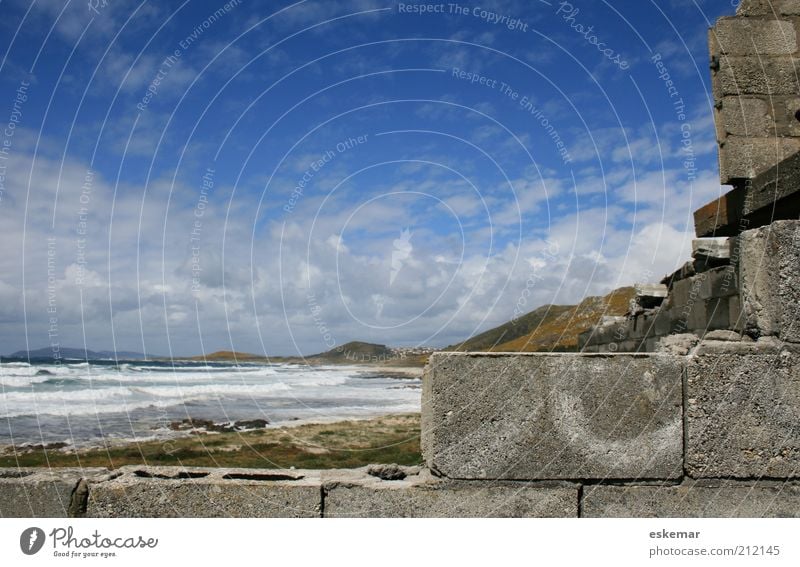 Carcass at the sea Beach Waves House (Residential Structure) House building Construction site Beautiful weather Hill Coast Galicia coast of death Wall (barrier)