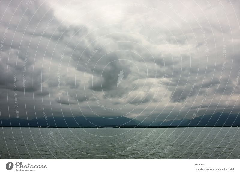 Stormy weather Mountain Sailing Nature Landscape Sky Clouds Horizon Weather Wind Rain Thunder and lightning Coast Lake Dark Gray moody Bad rainy cloudscape