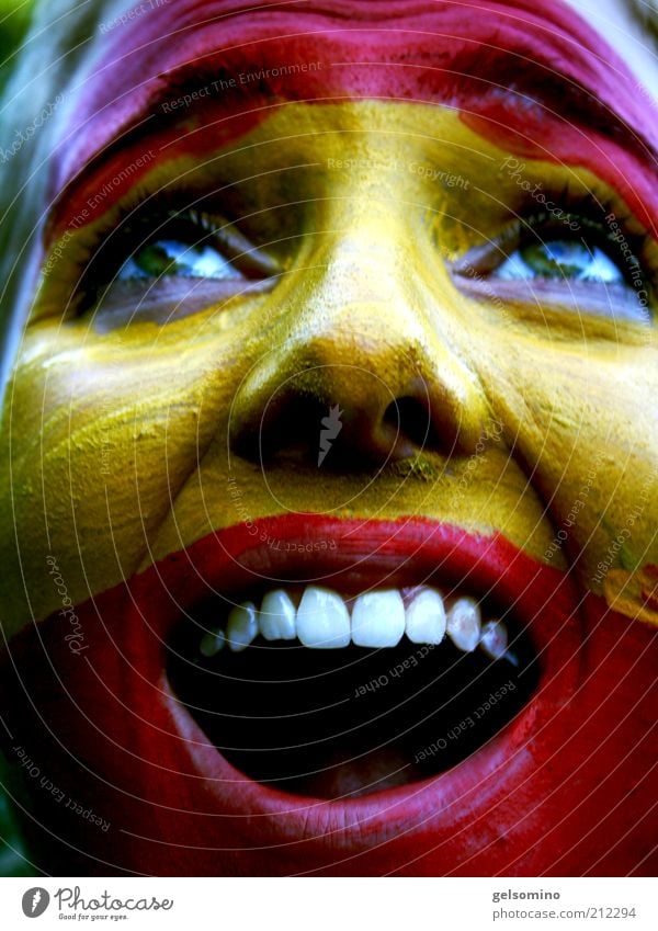 Spain Young woman Youth (Young adults) Face Scream Yellow Red Colour photo Exterior shot Day Portrait photograph Facial painting Teeth Enthusiasm Joy Fan