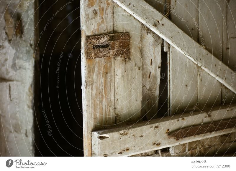 a piece of Z Deserted Building Door Old Living or residing Natural Trashy Nostalgia Decline Past Transience Change Barn Barn door Locking bar Wood Wooden board