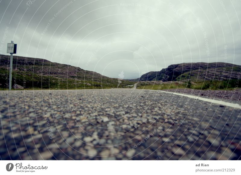 roadrunner Racecourse Landscape Clouds Horizon Fog Rain Grass Bushes Hill Rock Mountain Scotland Traffic infrastructure Street Infinity Colour photo