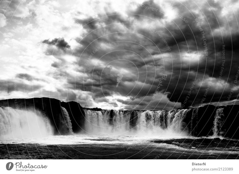 Godafoss Environment Landscape Water Sky Clouds Storm clouds Weather Bad weather Rock Canyon Waves River bank Brook Waterfall Gray Black White Iceland Power