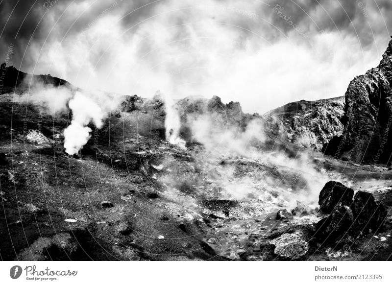 Hot springs Environment Nature Landscape Elements Sand Air Sky Clouds Weather Bad weather Rock Mountain Gray Black White Iceland Source Steam Smoke