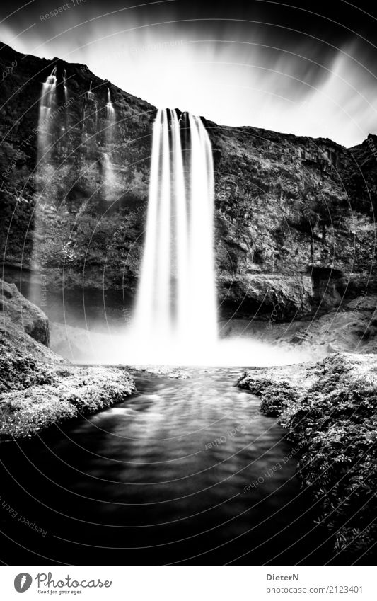 waves Environment Nature Landscape Sky Clouds Summer Weather Bad weather Grass Meadow Rock Waves River bank Brook Waterfall Gray Black White Iceland