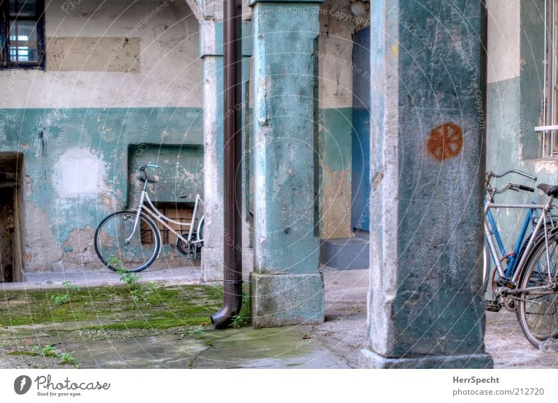 Backyard, turquoise House (Residential Structure) Wall (barrier) Wall (building) Window Door Column Rain gutter Grating Plaster Bicycle Old Dirty Trashy HDR