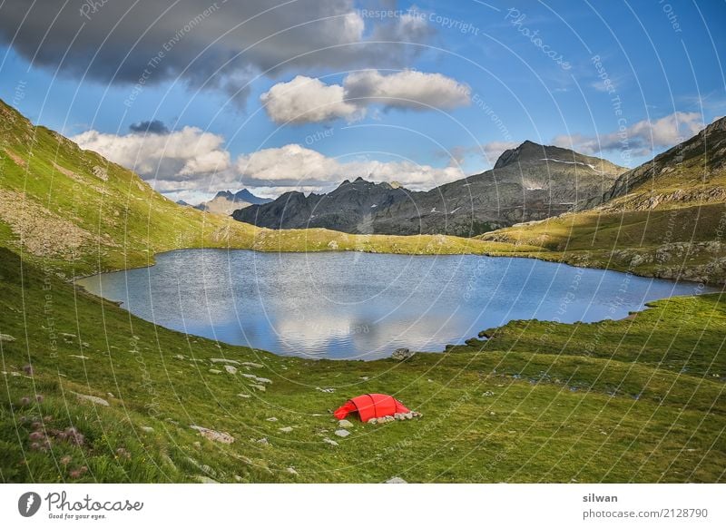 Mountain lake with tent Expedition Camping Summer Hiking Landscape Storm clouds Beautiful weather Rock Alps Peak Lake Exceptional Free Gigantic Glittering