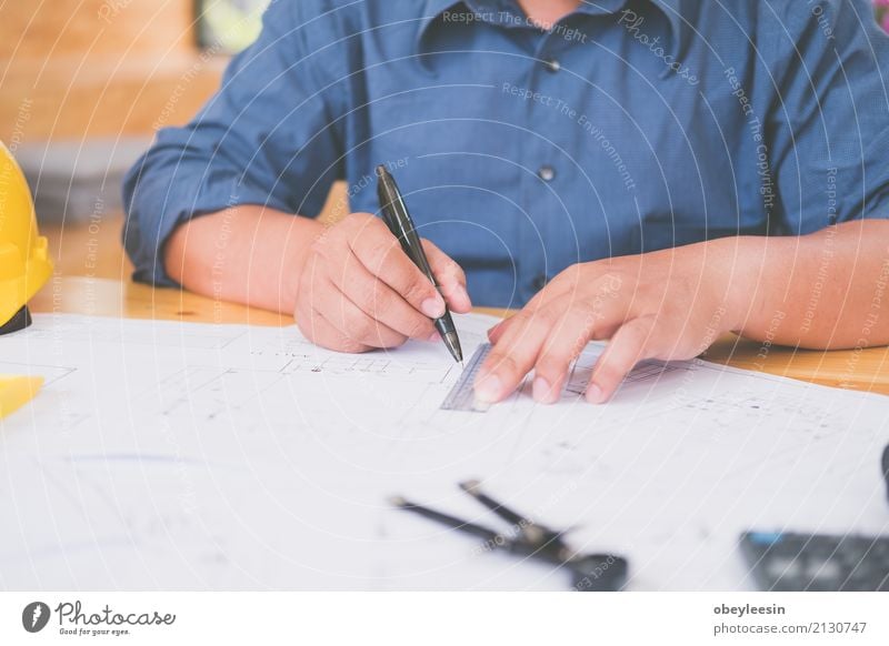 Architect or planner working on drawings for construction Design Desk Work and employment Profession Office Business Meeting Computer Notebook Technology