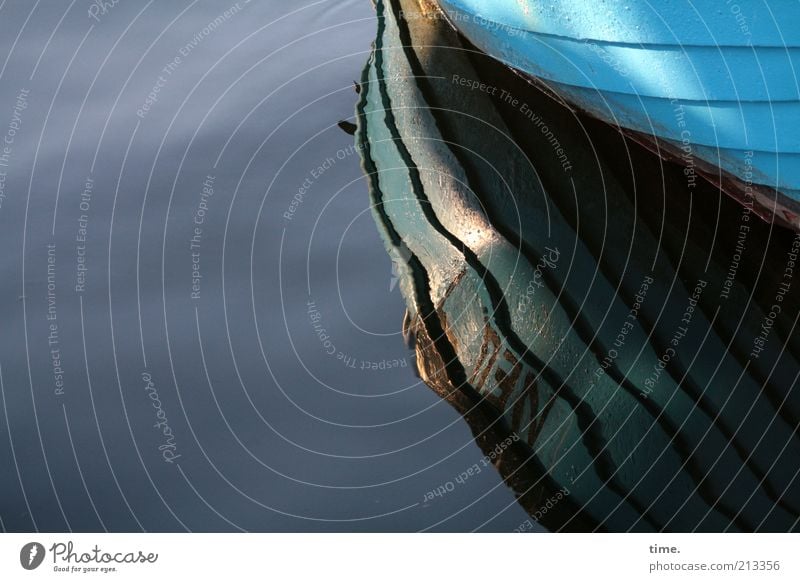 just lie around Watercraft boat wall Turquoise Reflection Wet Damp Exterior shot Deserted Lie Shadow Sun Groove Structures and shapes Surface of water