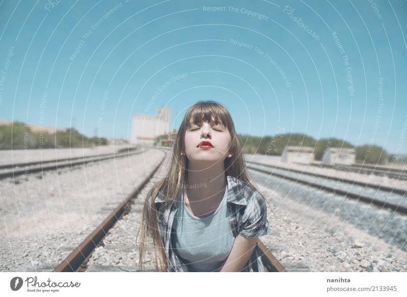 Young woman breathing in a railway road Lifestyle Human being Feminine Youth (Young adults) 1 18 - 30 years Adults Sky Rail transport Railroad Blonde