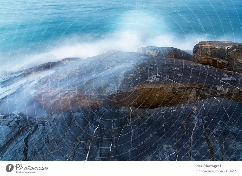 Foaming spray Water Wind Waves Coast Ocean Cold Wet White crest Rock Colour photo Exterior shot Copy Space bottom Long exposure Stone Rocky coastline Deserted