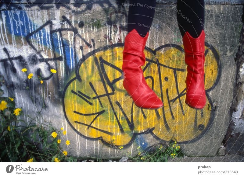 Red boots in the clouds Human being Androgynous Young woman Youth (Young adults) Woman Adults Feet Wall (barrier) Wall (building) Fashion Tights Boots Sit Fresh