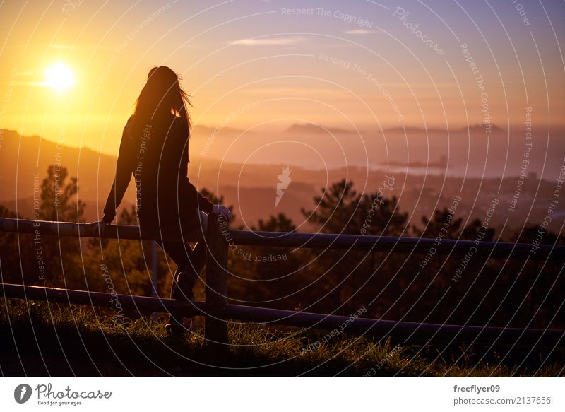 woman contemplating the sunset over three islands Vacation & Travel Tourism Summer Ocean Island Human being Young woman Youth (Young adults) 1 18 - 30 years