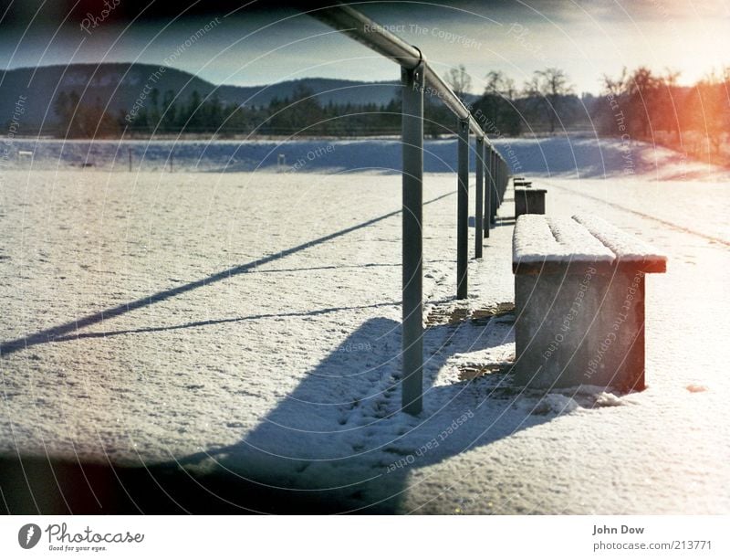 wintry glowing Winter Snow Beautiful weather White Idyll Past Transience Winter light Winter break Snowscape Powder snow Stagnating Break Park bench Handrail