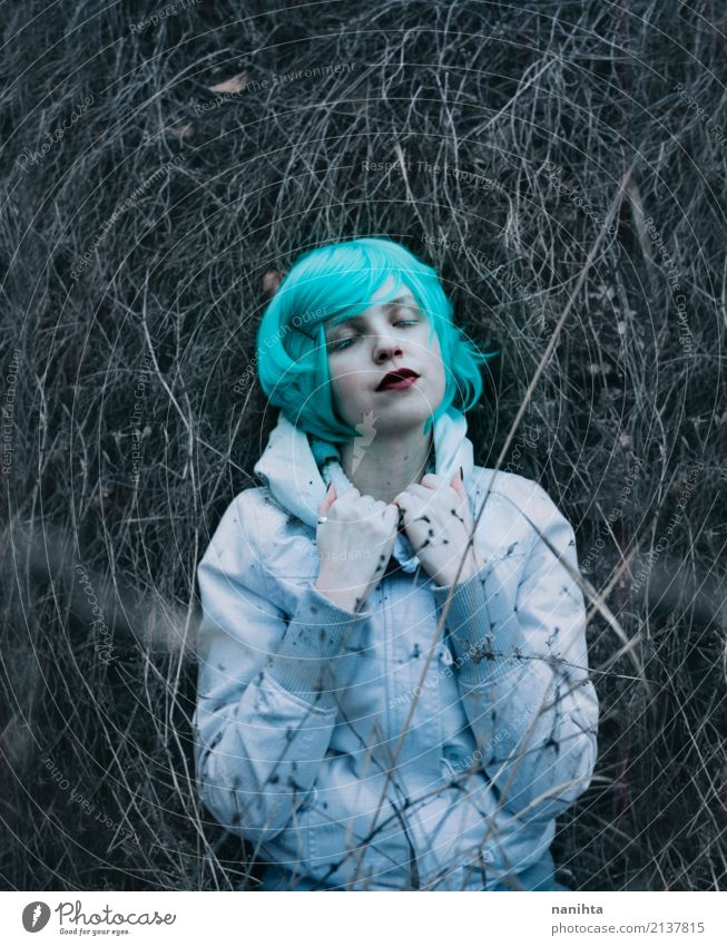 Young lost woman lying on dried branches Beautiful Make-up Human being Feminine Young woman Youth (Young adults) 1 18 - 30 years Adults Nature Plant Winter Coat