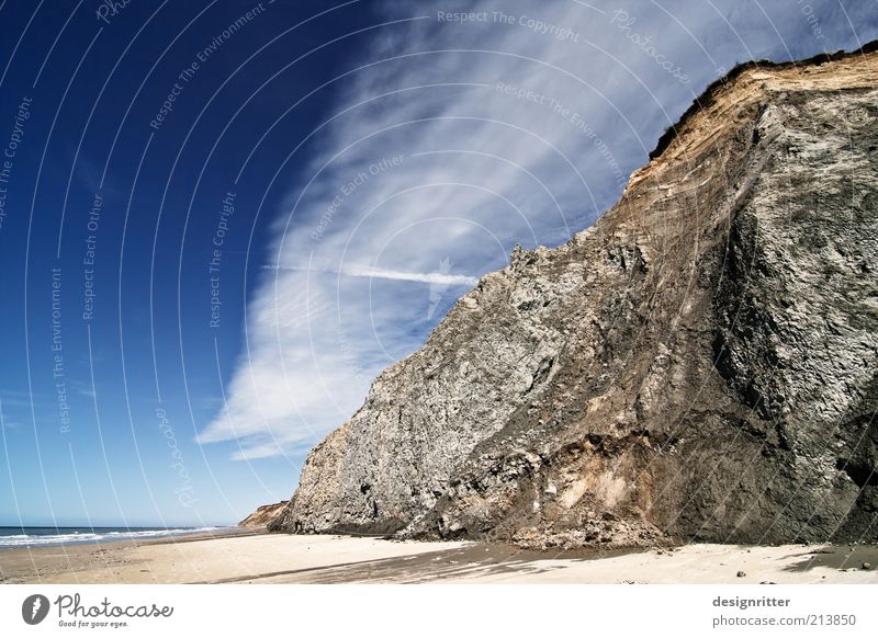 mirror image Vacation & Travel Tourism Far-off places Freedom Sky Clouds Summer Beautiful weather Coast North Sea Ocean Cliff Sand Gigantic Large Tall Calm