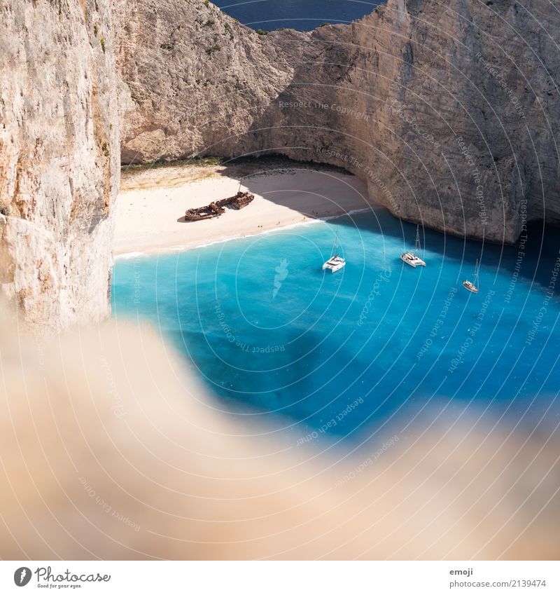 shipwreck Environment Nature Landscape Summer Beautiful weather Warmth Rock Beach Bay Ocean Exceptional Blue Wreck Tourist Attraction Vacation photo