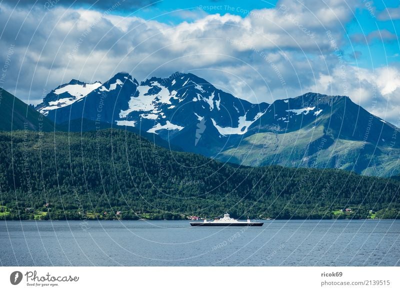 View of the Storfjord in Norway Relaxation Vacation & Travel Tourism Mountain Nature Landscape Water Clouds Rock Fjord Tourist Attraction Ferry Watercraft Idyll