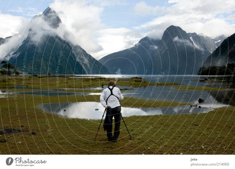 The Photographer Take a photo Man Adults Nature Landscape Fog Mountain Lakeside Fjord Bog Marsh Work and employment Observe Vacation & Travel Esthetic Adventure