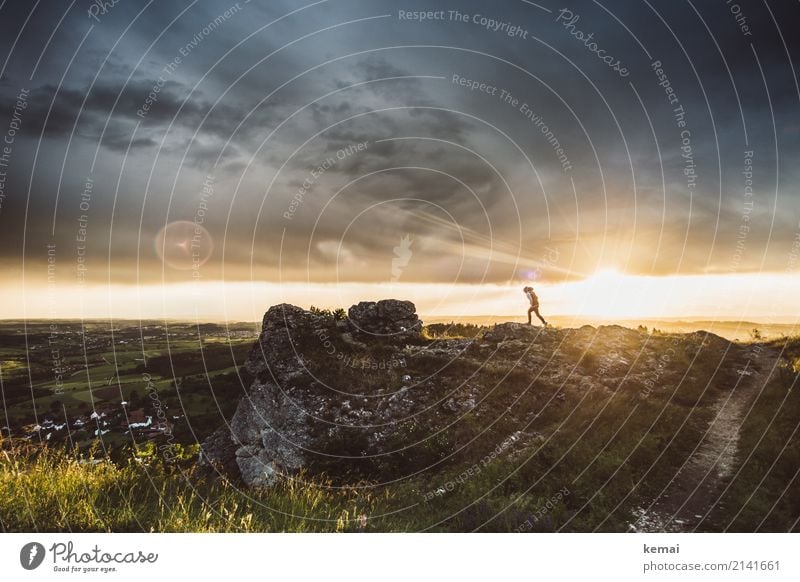 Man walks on rock in cloudy sunset Lifestyle Leisure and hobbies Vacation & Travel Trip Adventure Far-off places Freedom Human being 1 Environment Nature