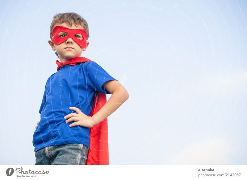 Happy little child playing superhero. Kid having fun outdoors. Concept of boy power. Lifestyle Joy Beautiful Playing Vacation & Travel Adventure Freedom Summer