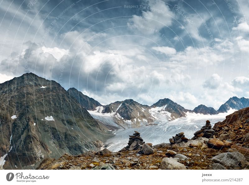 Eternity and transience Mountain Landscape Elements Earth Sky Clouds Summer Beautiful weather Alps Peak Glacier Old Blue Brown Calm Freedom Austria