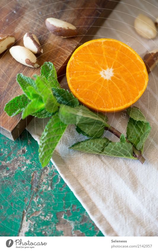 Orange and mint Breakfast fruit Mint Nut Fruit Healthy Food Nutrition Delicious Fresh Healthy Eating Vegetarian diet Organic produce Colour photo Vegan diet