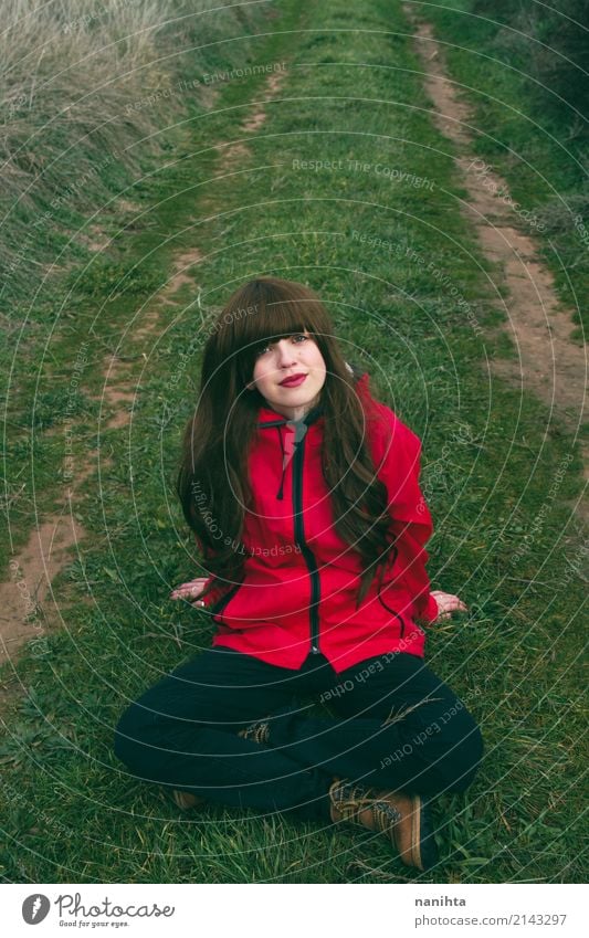 Young woman sitting in a green rural path Lifestyle Wellness Relaxation Vacation & Travel Tourism Adventure Freedom Expedition Hiking Human being Feminine