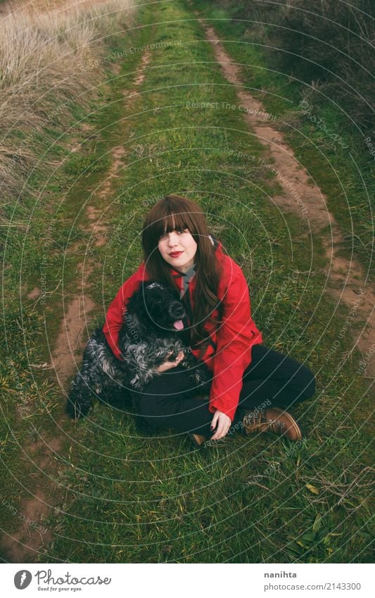 Young woman with her dog in a green rural path Lifestyle Adventure Freedom Expedition Hiking Human being Feminine Youth (Young adults) 1 18 - 30 years Adults