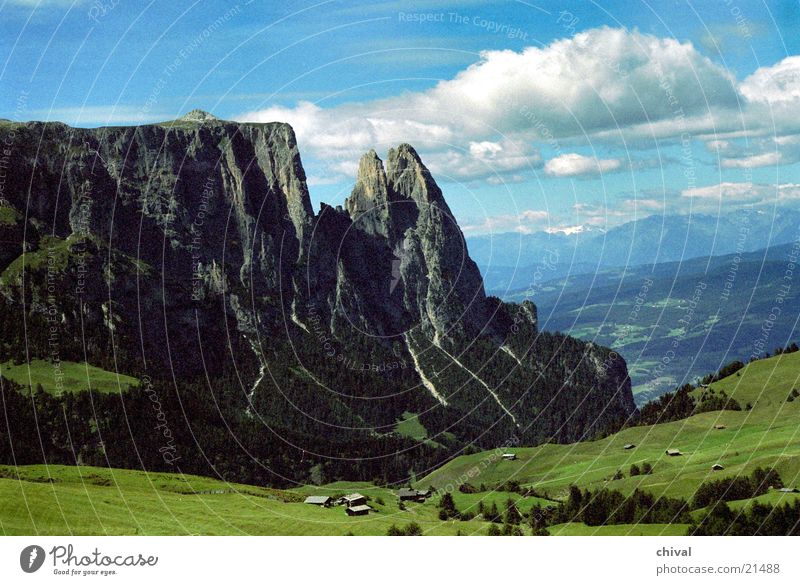 Alpe di Siusi South Tyrol Seiser Alm High plain Meadow Clouds Grainy Mountain Alps Santer Point Rock Vantage point Far-off places