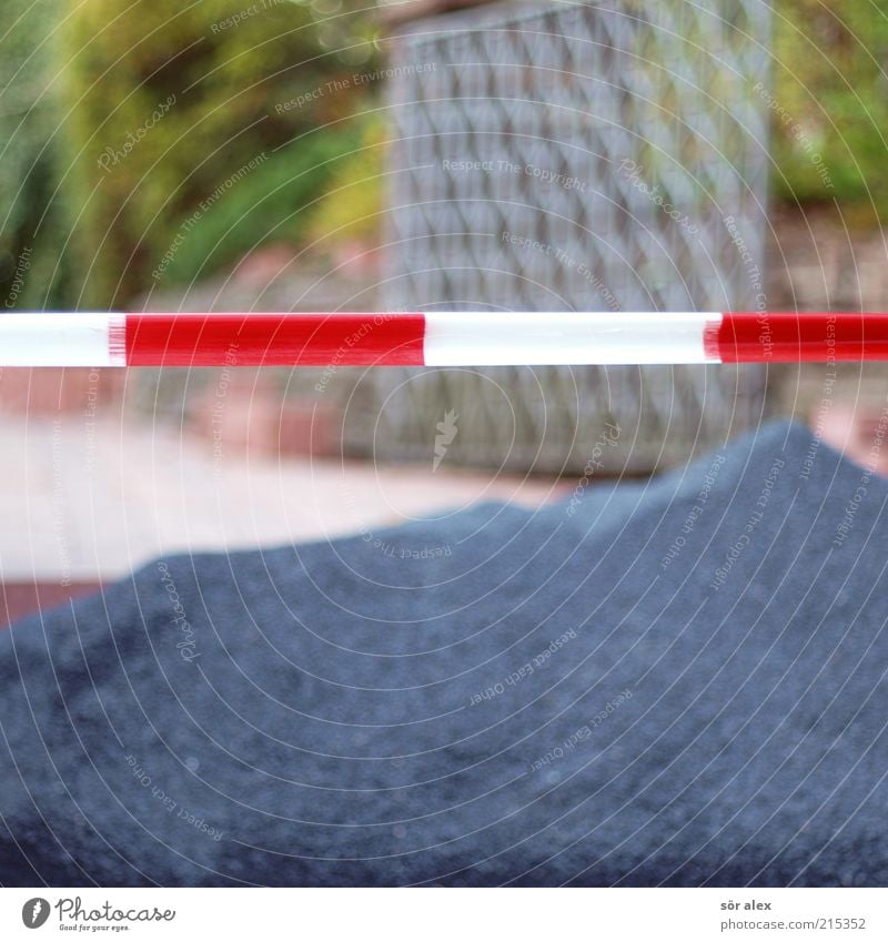 courtyard entrance Courtyard entrance Gravel Cobbled pathway Barrier Gate Stone Metal Build Blue Red White Determination Diligent Effort Stress Passage