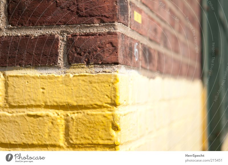 Corner 126th and 2nd Building Wall (barrier) Wall (building) Facade Brown Yellow Brick wall Dye Border Seam Colour photo Exterior shot Structures and shapes