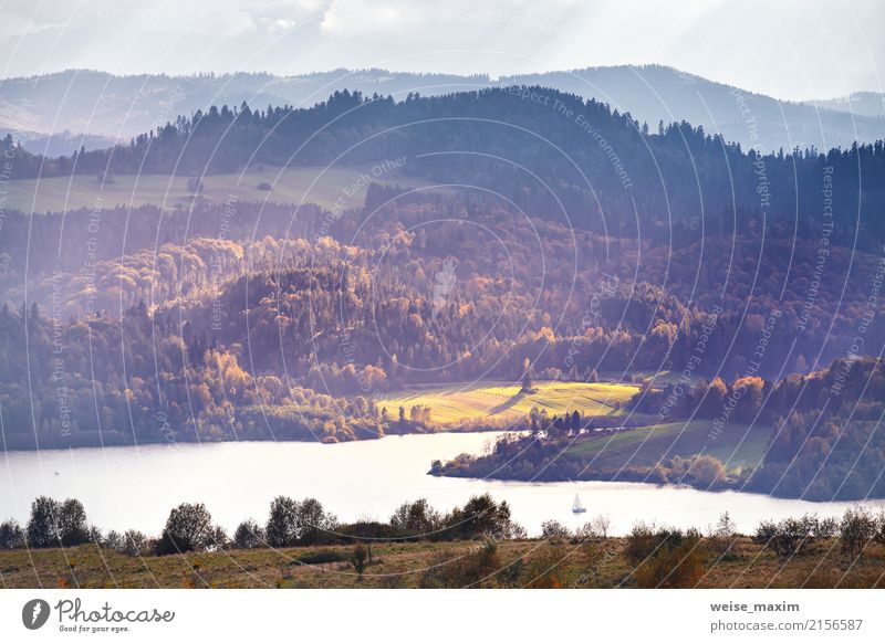 Lake behind foothills of tatra mountains. Autumn sunset Vacation & Travel Tourism Trip Far-off places Freedom Summer Mountain Nature Landscape Water Sky Climate