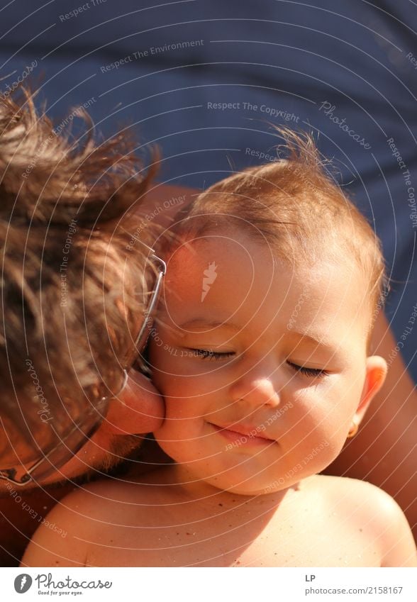 small happy child with eyes closed, kissed by her father Lifestyle Joy Beautiful Face Vacation & Travel Mother's Day Parenting Education Human being Child Baby