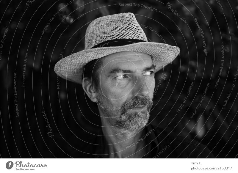 Man with straw hat Human being Masculine Adults Head 1 45 - 60 years Senses Beard hair Straw hat Hat Black & white photo Berlin Prenzlauer Berg Exterior shot