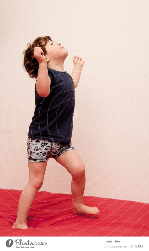 hmm Masculine Child Boy (child) 1 Human being 3 - 8 years Infancy T-shirt Underwear Brunette Playing Blue Red White Joy Barefoot Movement Colour photo