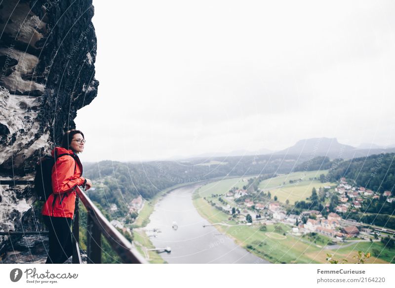 Hiking (07) Feminine Young woman Youth (Young adults) Woman Adults 1 Human being 18 - 30 years 30 - 45 years Adventure Nature Saxon Switzerland Rain jacket Red