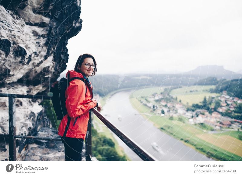 Hiking (09) Feminine Young woman Youth (Young adults) Woman Adults 1 Human being 18 - 30 years 30 - 45 years Adventure Saxon Switzerland Rain jacket Red